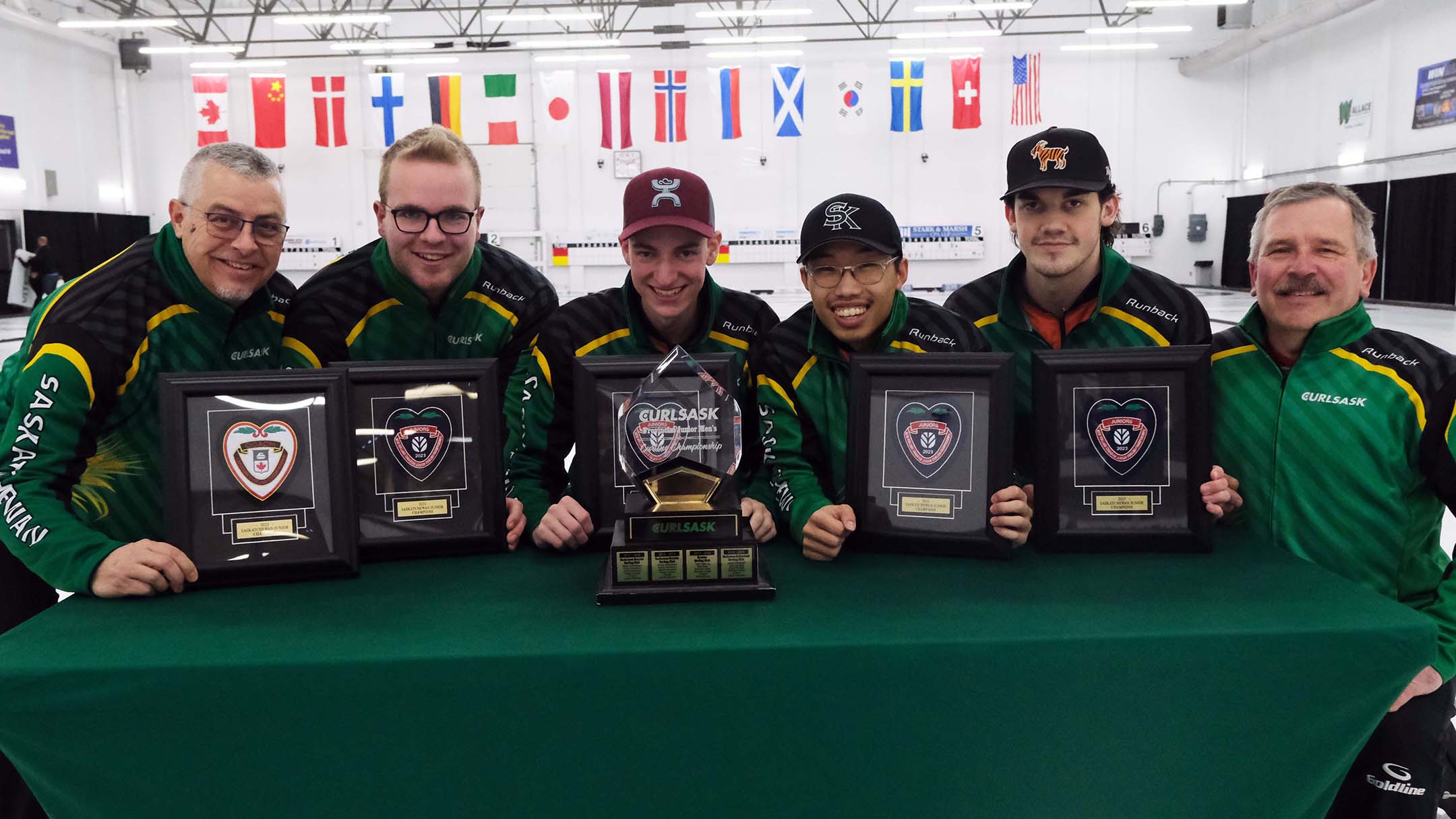 Team Ede with their championship green jackets. Moskaluke left, Hom fourth from left. (Photo submitted)